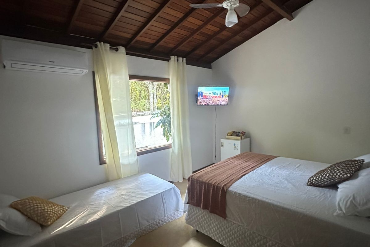 Suíte Tripla vista para Mata