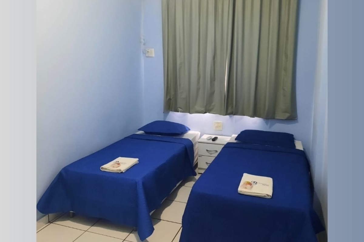Apartamento Quadruplo com 1 cama de casal e 2 camas de solteiro