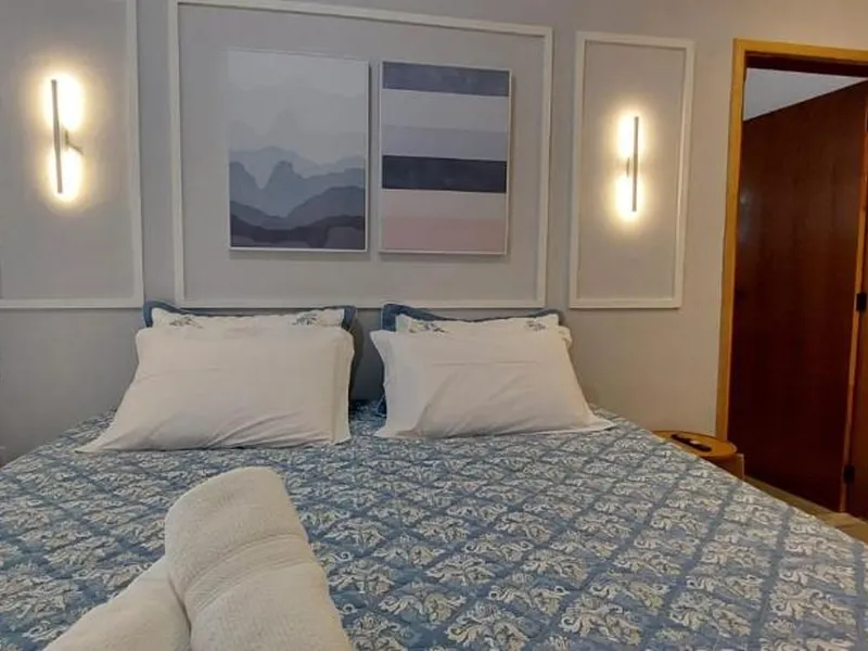 Suíte com cama queen-size e varanda