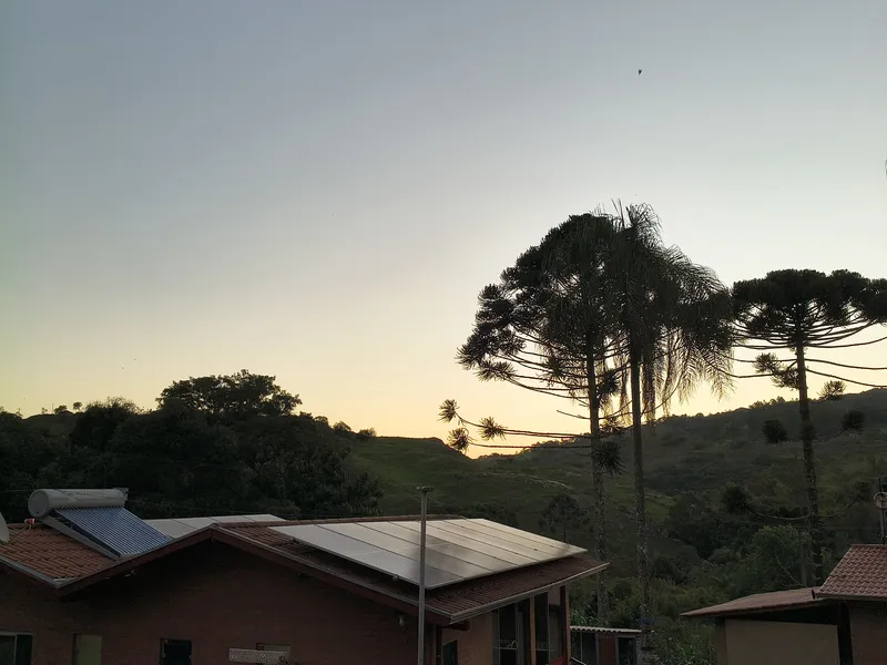 Triplo standard com vista para o por do sol