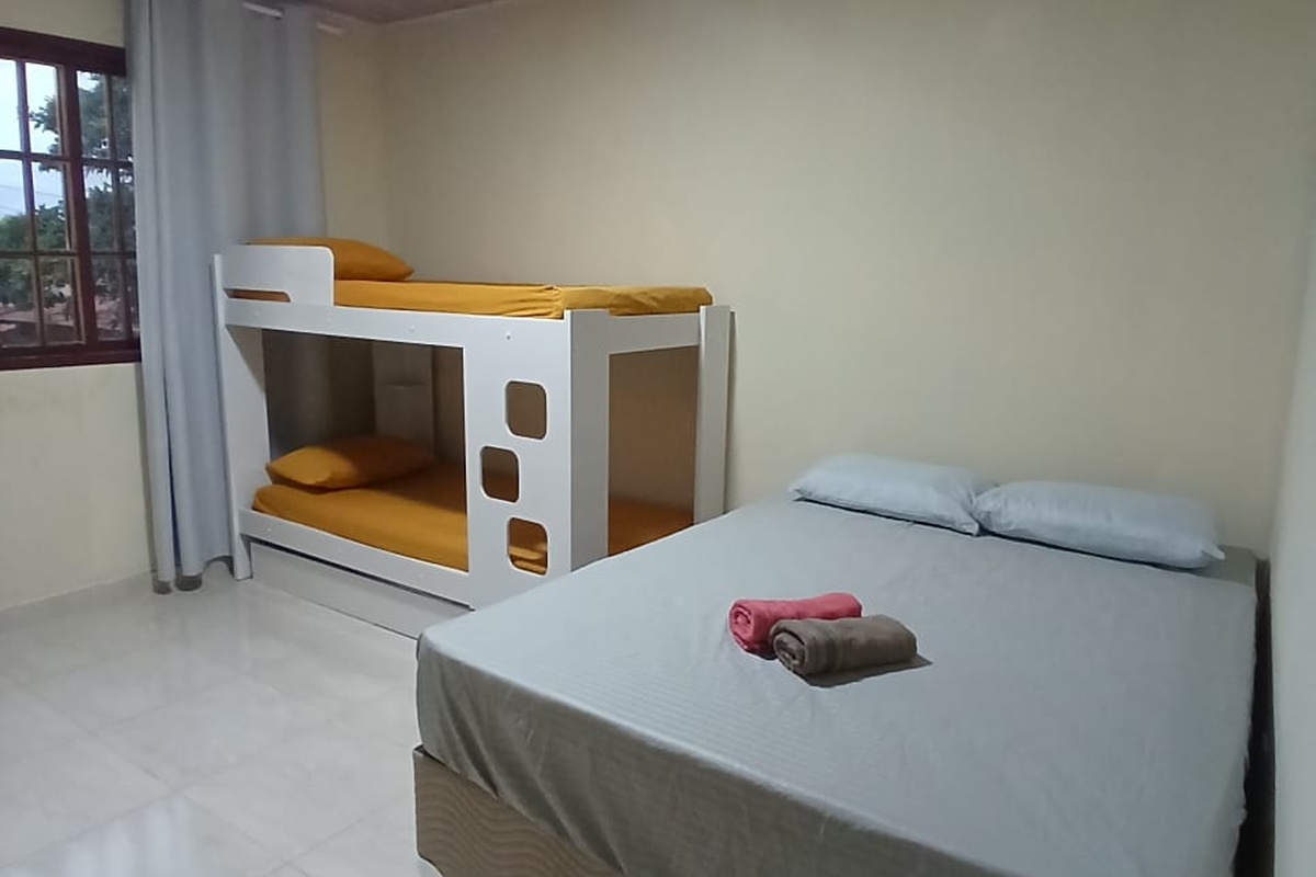 1 cama de casal + 1 triliche