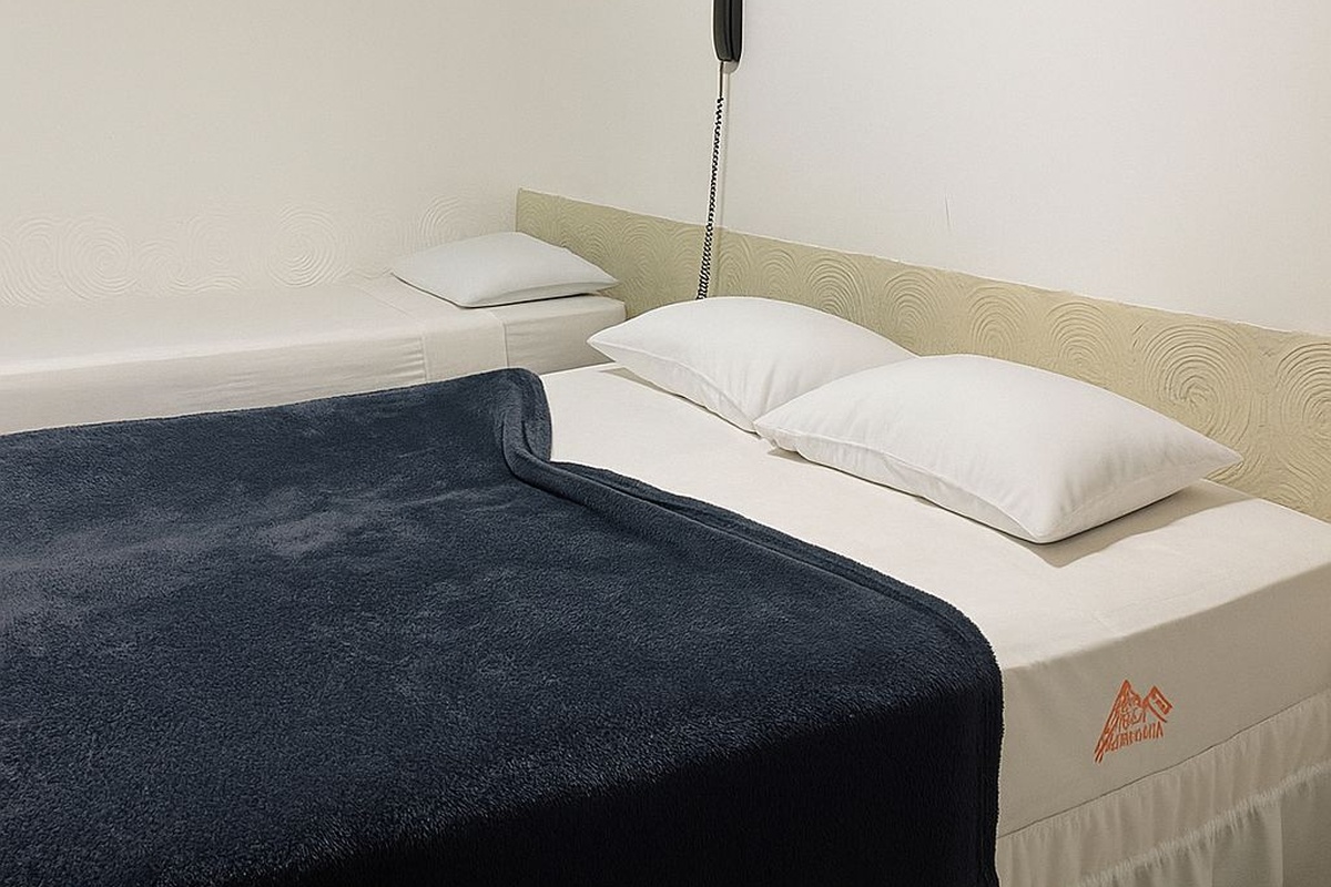 Triplo com ar condicionado