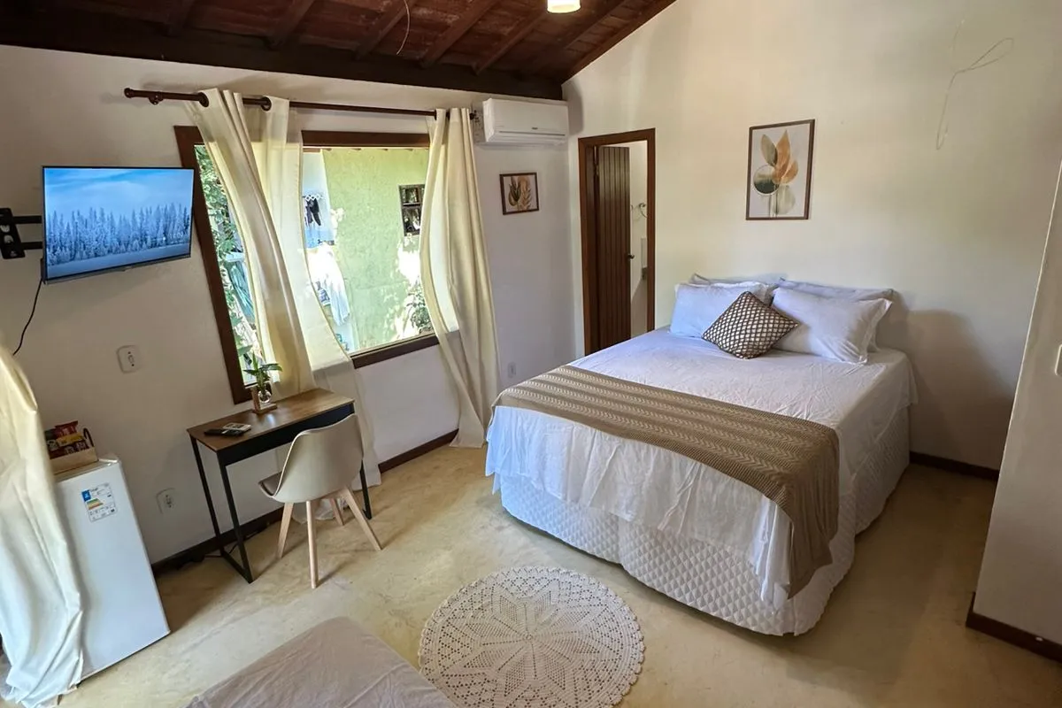 Suíte com Vista para a piscina
