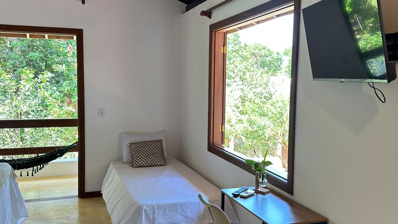 Suíte com Vista para a piscina