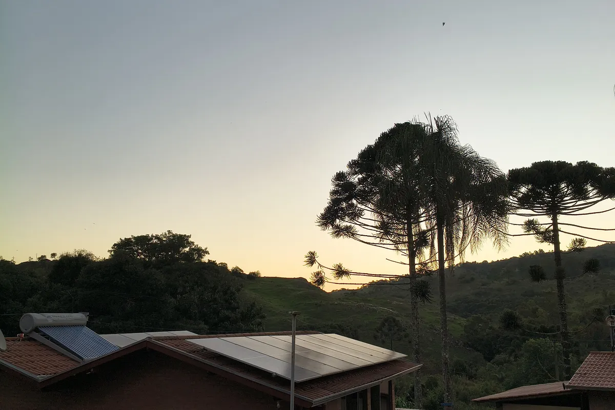 Triplo standard com vista para o por do sol