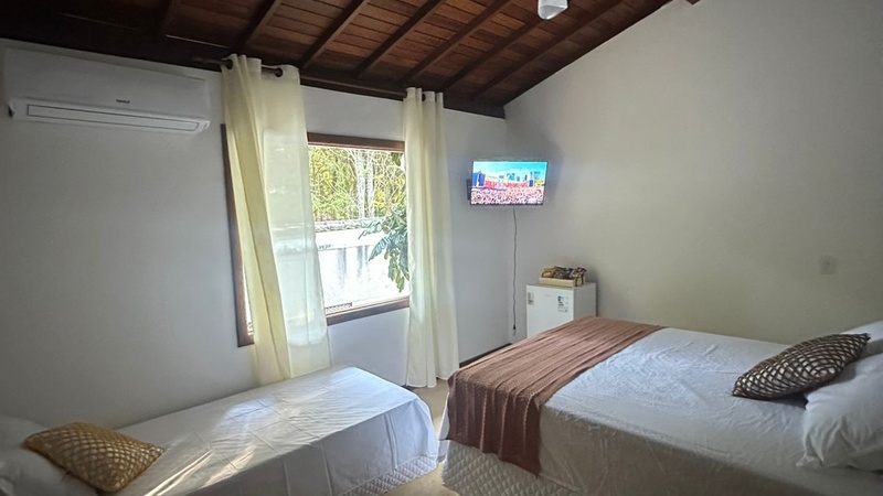 Suíte Tripla vista para Mata